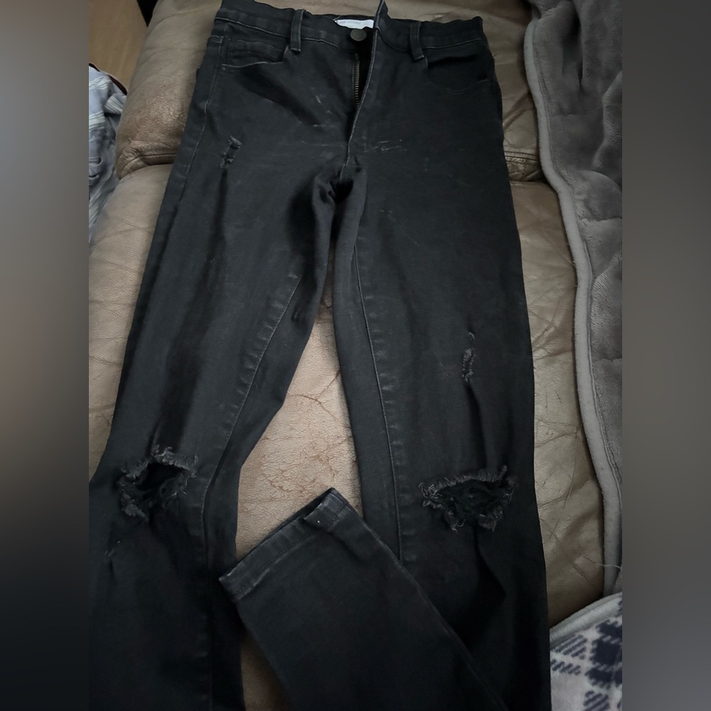Black garage ripped jeans
